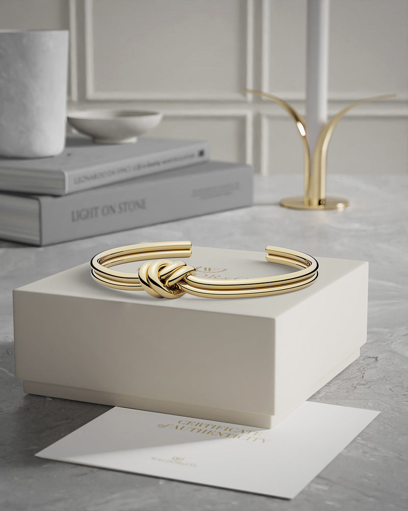 Staging reference — polished knot bangle presentation
