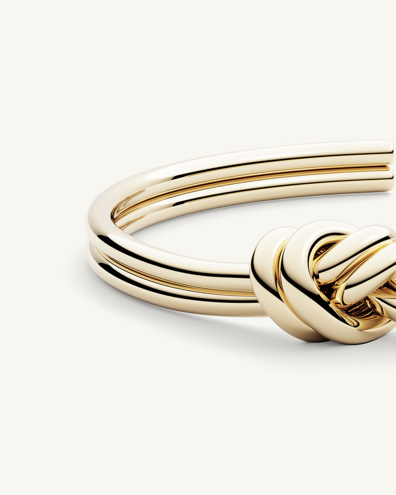 Staging reference — polished knot bangle detail